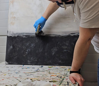 Henri Hagelberg working on original textured painting Scorched